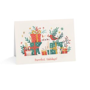 Eco-friendly greeting card featuring a festive cat surrounded by gifts and holiday greenery